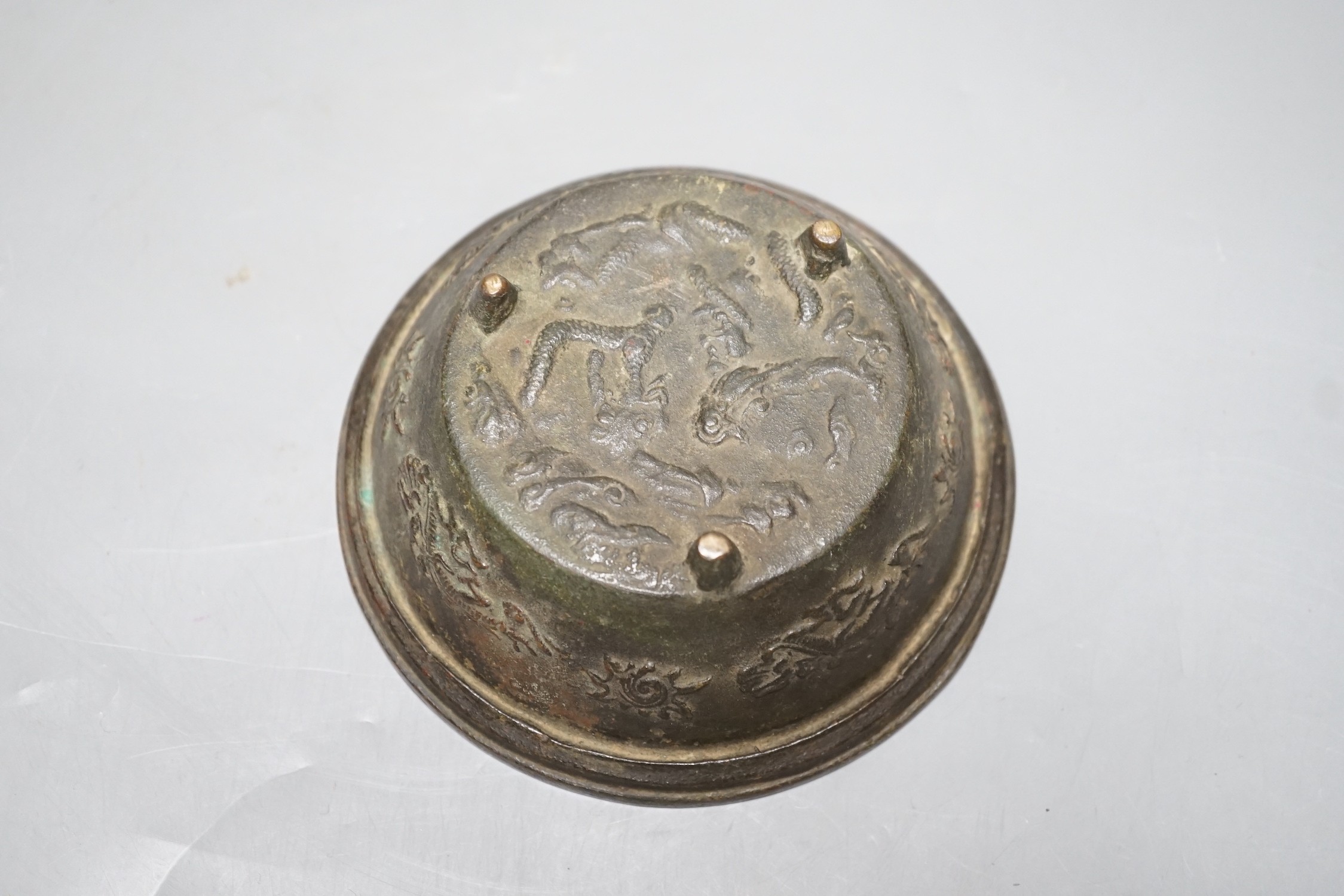 A Chinese bronze bowl, with inscriptions, possibly 18th century, 13.5cm diameter